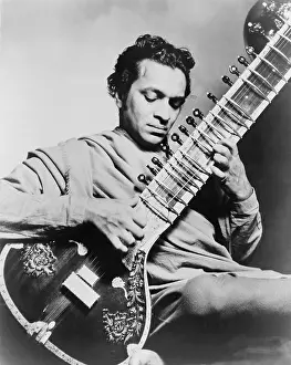 Shankar: Ravi Shankar (b. 1920), playing the sitar. ?