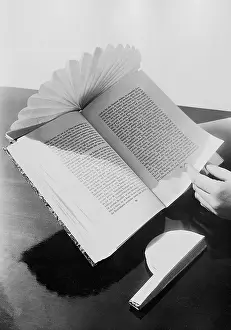 Brightly: Reading visor against the sun, 1935
