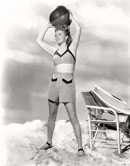 Leggy: Ready to play ball at the beach