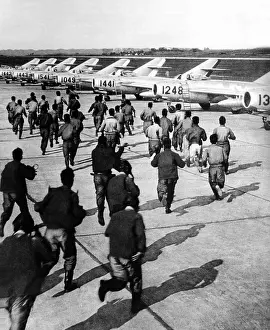 Ideologies: Red Chinese Army Mig Pilots rush to their ?