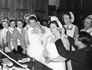 Donating: Red Cross nurses during a blood test, 1940