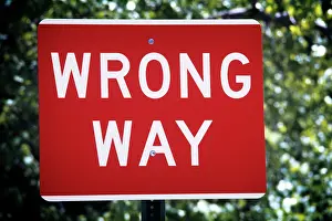 Boldly: Red and White Sign Boldly Stating Direction As Wrong Way