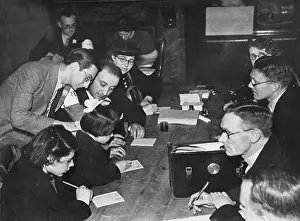 Distributing: Refugee distribution centre WWII