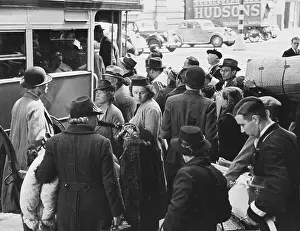 Refugees boarding bus WWII