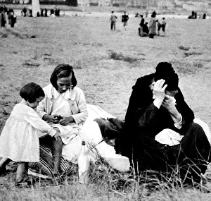 Irun: Refugees from Irun sitting on the beach at Hendaye; Spanish