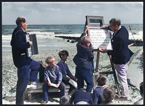 Prompting: Religious service being held on a beach