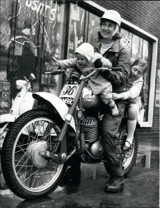 Bumps: Rene Bennett on motorcycle with her two children