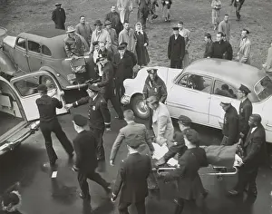 Congressmen: Rep. Clifford Davis, is carried from the Capitol