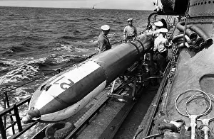 Torpedoes: Repair work on a training torpedo, 1937