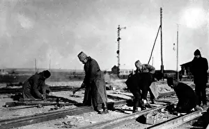 Construct: Reparing railroad tracks