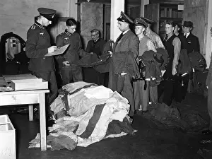 Transferred: Reservists give in their uniforms in the wardrobe, 1938