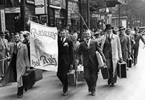 Passerby: Reservists walk through Berlin, 1937