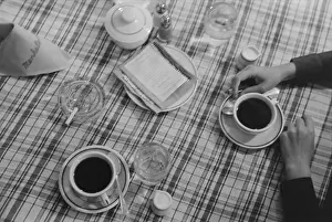 Addictions: Restaurant still life of coffee and cigarettes. ?