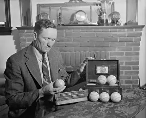 Baseballs: Retired baseball legend Walter Johnson with souvenir
