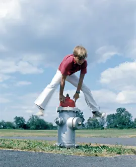 Hydrant: Retro 1970s Boy Jumping Over Fire