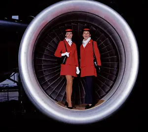 Sk-images: Retro Air Hostesses in aeroplane engine