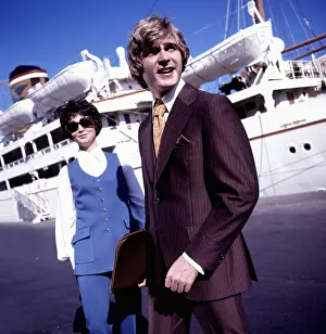 Sk-images: Retro British couple modelling suits