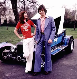 Sk-images: Retro couple with custom made car 1970s
