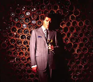 Haircuts: Retro man in wine cellar