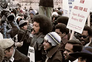 Announcement: Reverend Jesse Jackson surrounded by marchers