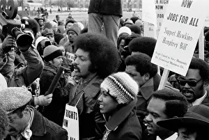 Announcement: Reverend Jesse Jackson surrounded by marchers