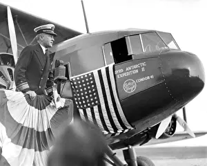 Byrd: Richard E Byrd, polar explorer, with plane