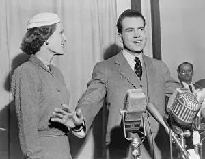 Lcgr1409: Richard Nixon standing behind microphones with