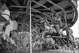 Funfair: Riding on the carousel