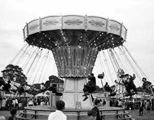 Roundabout: Riding carousel at fairground