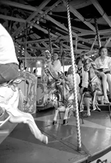 Funfair: Riding on a carousel - Funfair, Surrey