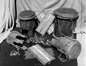 Rattles: On right, standing at back, the Mshirima'-a double