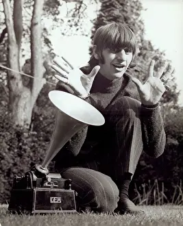 Loudspeaker: Ringo Starr, Beatles drummer, with old phonograph