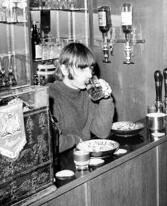 Commercially: Ringo Starr drinking at the bar in his home