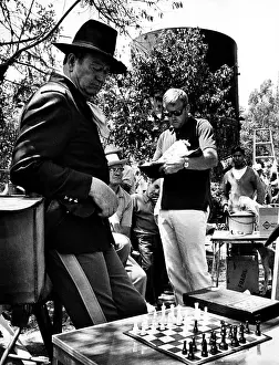Lobo: RIO LOBO, John Wayne (far left), on set, ?