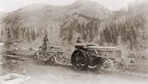 Grader: Road grader pulled by a steel wheeled tractor ?