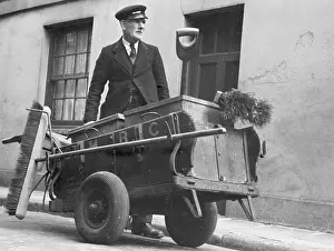 Sweeper: Road sweeper with his cart