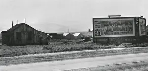 Steinbeck: Roadside migrant camp behind, Grapes of Wrath