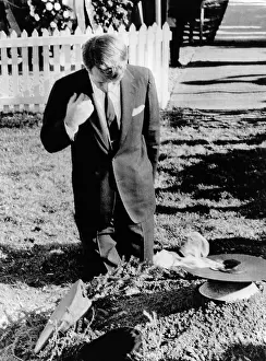 Csu 2012 11: Robert Kennedy prays at his brother's grave. ?