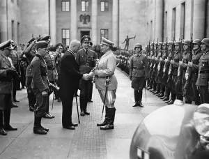 Hahn: Robert Ley, Hermann Goering, Albert Speer with a munitions w