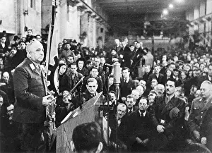 Suggestion: Robert Ley speaks in front of workers of an industrial compa