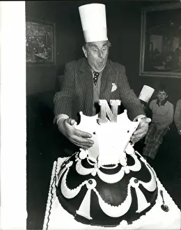 Proceeds: Robert Morley, actor, with a large cake, London