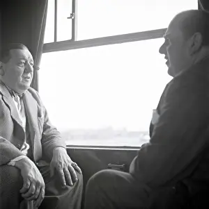 Compartment: Robert Morley and Michael North on a train