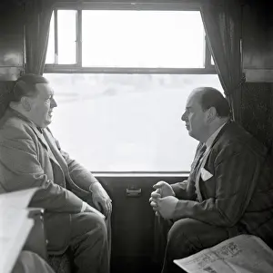Compartment: Robert Morley and Michael North on a train