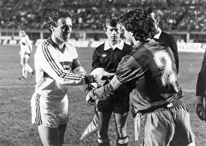 Exchanging: Robert Sara (left) exchanging pennants before