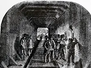 Caernarvon: Robert Stephenson putting the last rivet in the