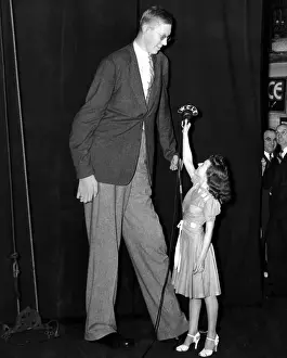 Rizzo: Robert Wadlow, World's Tallest man, with ?