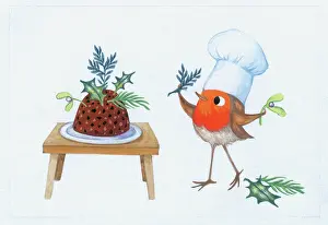 Robin decorating a Christmas Pudding