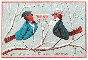 Two robins with drinks on a Christmas card