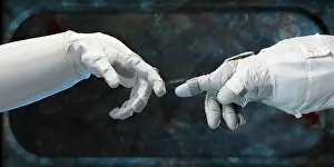 Robotics: Robonaut hand (left), and a spacesuit-gloved ?