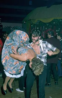 Twirl: Rock and roll dancing couple